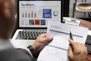 Man filing business tax return